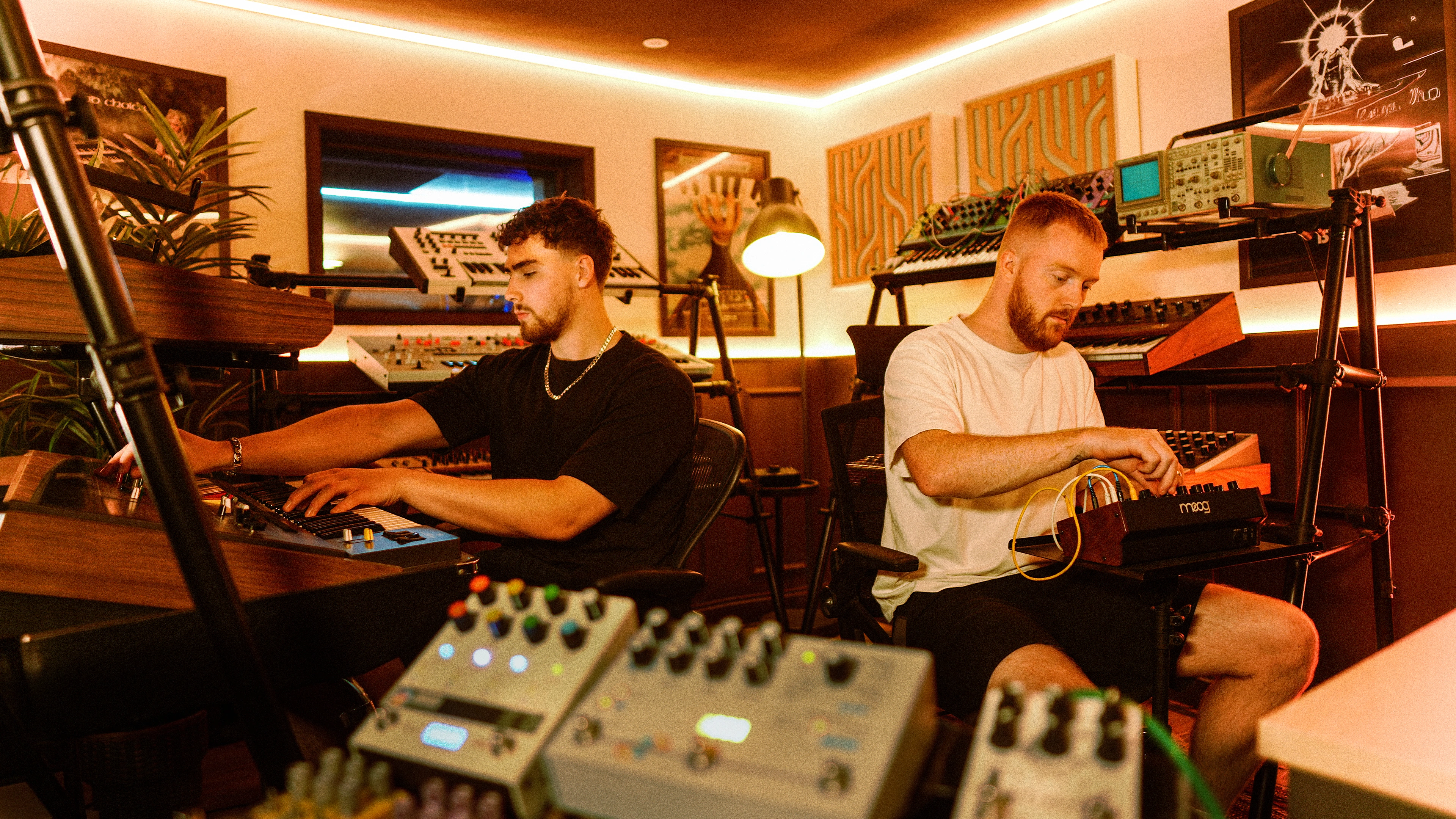The Synth Palace team in the studio, surrounded by the synthesizers behind the sounds